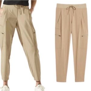 Athleta Go Far Travel Pant Joggers Zip Pockets Tan Size 8